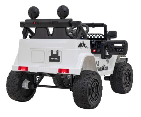 Toyota FJ Cruiser dla dzieci Biały + Pilot + Napęd 4x4 + Audio LED + EVA + Wolny Start Toyota FJ Cruiser dla dzieci Biały + Pilot + Napęd 4x4 + Audio LED + EVA + Wolny Start